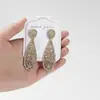 Pendientes Amazon transfronterizos, extragrandes, electrochapados, elegantes, de estilo largo, con un toque de alta gama, adornados con borlas y pedrería negra