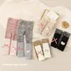 Leggings para niñas, pantalones de algodón coloridos para bebé, calcetines cubrebotas de dibujos animados, leggings para niños, ropa elegante para exteriores y calcetines de volantes de moda