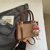Bolsa de Mão Casual de Nicho Versão Coreana Bolsa para o Trabalho para Mulheres Outono 2025 Nova Moda Elegante Simples de Ombro Único Transversal