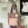 Design de nicho de alto valor bolsa tote japonesa moda grande capacidade estudantes do ensino fundamental estudantes do ensino médio classe portátil bolsa de maquiagem