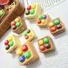 Accesorios de resina de frijoles de chocolate de caramelo de dibujos animados 3D, accesorios para el cabello DIY con pegamento de crema, colgantes para teléfono, hebillas de zapatos, venta al por mayor de accesorios pequeños