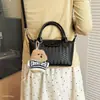 Bolso cruzado tejido de diseño de nicho nuevo 2026, bolso de mano versátil casual para mujer, estilo albóndiga