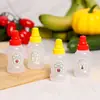 Botella de salsa especial de fábrica directa transfronteriza, botella pequeña linda para apretar, botella de condimento, botella secundaria de salsa de tomate para ensalada, lote