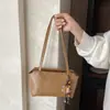 Bolsa de Axila Feminina 2026 Nova Tendência Outono High-End Vintage para o Dia a Dia Bolsa de Ombro Fashion Versátil Bolsa de Mão