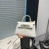 Bolsos de Diseño de Nicho de Moda Verano 2026 Moda de Verano de un Solo Hombro de Moda Nuevo Simple Cruzado para Viajar Pequeño Cuadrado