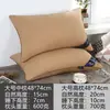 Un par de almohadas viene con una funda de almohada para dormir, núcleo de almohada de hotel, soporte para el cuello, uso doméstico, terciopelo de plumas para la siesta