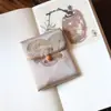 Muestra de pedido final se puede pedir bolsa de tela de brocado para regalo bolsa Wenwan estilo japonés bolsa de almacenamiento de joyas billetera plegable tela