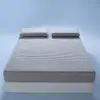 Sábana bajera acolchada impermeable grado A protector de colchón a prueba de orina para dormitorio de estudiante juego de tres piezas engrosado de color sólido 1.8m 1.5m