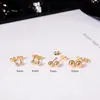 Pendientes de titanio con baño de oro real de 18 quilates, mini pendientes de cuenta dorada, joyería de oreja redonda simple para uso diario para mujer, no se decolora