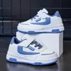Zapatos Blancos para Niños al por Mayor Primavera 2026 Nuevos Transpirables Unisex Zapatos Deportivos para Niños Niños Medianos y Mayores Zapatos de Tabla Casuales Modernos