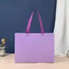 Bolsas de tela no tejida tridimensionales, gruesas, en stock y de moda, adecuadas para tiendas de ropa, centros comerciales y como bolsas de compras ecológicas.; se puede personalizar con un logo