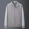 Sudadera con cremallera estilo cárdigan con cuello alto, engrosada para abrigar, diseño versátil, con tres franjas, top casual, unisex, y adecuada para parejas
