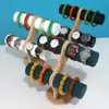 Moda nuevo brazalete reloj joyería almacenamiento expositor de pie de doble capa de franela soporte para pulseras mostrador exhibición puesto de mercado nocturno