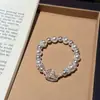 Pulsera Mecedora con Perlas Swarovski Grandes y Pequeñas en Bloques de Color Estilo Princesa Llena de Pedrería para Mujer, Pulsera Versátil Elegante de Lujo Ligero de Nicho