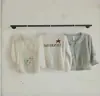 Colgador para tienda de ropa, expositor de pared, colgador lateral de pared, colgador de pared para venta de ropa, colgador de clavo en pared
