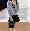 Estilo Coreano 2025 Primavera y Otoño Nuevo Estilo Pequeño Lazo Fragante Suéter Suave y Ceroso Cárdigan para Mujer Encaje Botón de Corazón Chaqueta de Punto