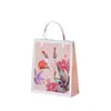 Bolsa de oreja de tenedor portátil de plástico Bolso de mano de regalo con carta manual de Comercio Exterior Bolsita plana especial para tienda libre de impuestos hdpe Mano de bolsa de compras