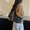 Bolsa de lona de gran capacidad para mujer, nueva bolsa de mano casual de otoño 2026 para la escuela y el trabajo, de hombro y de mano