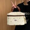 Bolsa de Maquiagem Donut de Chá com Leite Feminina 2025 Nova de Alto Valor de Cor Portátil de Grande Capacidade Bolsa de Armazenamento de Maquiagem Bolsa de Mão