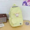 Mochila nueva y elegante de alta capacidad para niñas de primaria, secundaria y preparatoria, mochila versátil de color sólido con múltiples compartimentos