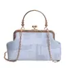 Hebilla de clip retro europea y americana concha modelo nuevo 2026 cadena texturizada bolso de hombro versátil bolso cruzado bolso de moda para mujer bolso de noche