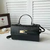 Bolsa de mão transfronteiriça para mulheres, novo estilo 2026, bolsa quadrada pequena orientada para exportação, bolsa Kelly tecida em relevo, bolsa de ombro, bolsa transversal