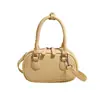 Bolsa de Mão Mini Simples Estilo Coreano Bolsa Bowling Feminina Nova Primavera 2025 Leve Luxo Moda Nicho Bolsa de Ombro Transversal
