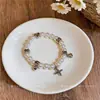 Pulsera de Perlas con Colgante de Corazón Estilo Coreano Nicho Moda de Alta Gama Exquisita Cadena de Mano Versátil Joyería de Mano para el Viaje Diario para Mujeres