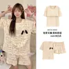 Conjunto de Pijama Feminino de Verão com Shorts de Manga Curta, Gola Redonda em Algodão Imitando Leite, Confortável, Solto e Respirável com Bojos
