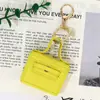Estuche para Auriculares Huayang, Bolsa Cuadrada Pequeña Multifuncional Nueva Huayang, Bolso Creativo para Labial, Llavero, Colgante de PU para Coche