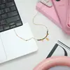 Elegante Colar de Pérolas e Pedra Olho de Tigre Europeu e Americano Acessórios para Mulheres, Joias de Aço Inoxidável, Joias Transfronteiriças de Luxo Leve, Design de Nicho