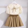 Conjunto de Ropa de Verano para Niñas 2026 Nuevo Elegante Moderno Camisa de Manga Corta y Falda Corta para Niños Mayores Ropa de Verano para Niños