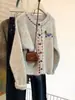 Fábrica de Jerseys Dalong Cardigan de Punto Grueso Color Albaricoque Cuello Redondo para Mujer Otoño e Invierno 2025 Nuevo Suéter Suave tipo Cera Chaqueta