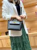 Bolsa Nueva de Alas 2022 2424 Bolso Cruzado Kelly Portátil Moda Bolso de Bola Joker Bolso de Mujer Color Crema