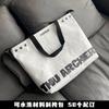 Bolsa de papel DuPont impermeable con logotipo personalizado impreso, lavable, de papel kraft, de un solo hombro, de moda, estilo retro, respetuosa con el medio ambiente, personalizada