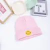 Gorro transfronterizo para mujer otoño e invierno etiqueta de cara sonriente gorro de punto para pareja moda grueso invierno jersey gorro de lana estudiante