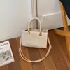 Bolso de mano tejido de alta gama 2026 Primavera Nuevo Diseño de nicho Bolso de axila Versátil Bolso de hombro para el día a día