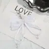 Chaveiro Super Fada Branco com Laço de Fita Pérola Estilo Coreano, Chaveiro Pingente de Bolsa Doce de Renda de Nicho