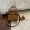 Bolso de Hombro Cruzado Tipo Cubo Versátil Casual Estilo Retro de Nicho para Mujer 2026