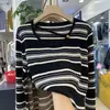 Suéter de punto a rayas para mujer, corte ajustado, ligero, diseño nuevo para primavera y otoño, de manga larga, versátil, top elegante