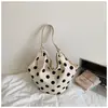 Bolsa de mano al por mayor transfronteriza para mujer con elegante estampado de lunares, bolso de mano de gran capacidad para compras, bolso de hombro de moda para el día a día