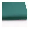 Algodón especial para hospital 108*50 hilo cardado verde oscuro ropa quirúrgica hospitalaria tela resistente al cloro y al blanqueo preencogido en proceso completo