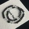 [Minimalista] Pulseira de Obsidiana Prateada com Contas Pretas Empilhadas Estilo Chinês Nicho Escuro Casal Masculino e Feminino Pulseira de Camada Dupla