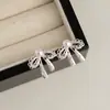 Pendientes de Botón con Lazo de Encaje y Perlas para Mujer 2026 Nuevos Dulces de Lujo Ligero Nicho Versátiles Exquisitos Accesorios para Pendientes