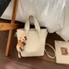 Bolsos Retro de Nicho para Mujer 2026 Nueva Moda Bolso de Mano de Alto Valor para el Trabajo Bolso Cruzado tipo Cubo