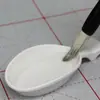 Suporte de caneta para pincel de caligrafia, porta-canetas, prato de tinta de plástico com formato de flor de ameixa, anti-queda, multifuncional, estudo, os quatro tesouros, atacado