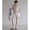 Camiseta retro de manga corta con cuello en V estilo francés para mujer, top de punto fino y transpirable de verano con diseño único de nicho