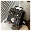 Bolsa Feminina Transfronteiriça Outono e Inverno Novo Estilo Original Estilo Britânico Mochila Xadrez Feminina Estilo Universitário Menina Viagem Mochila Multiuso