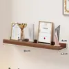 Estantería de pared Mueble flotante para TV en sala de estar Estante de almacenamiento de pared de una sola palabra Máquina para juguetes caseros Estante de almacenamiento de caja superior