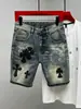 Shorts de mezclilla rasgados estilo retro americano de comercio exterior para hombre, estilo de verano fino, moda urbana de moda, shorts rectos holgados de longitud media